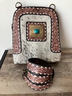 Buckle bag 11"x12" cowhide may vary as no 2 are the same